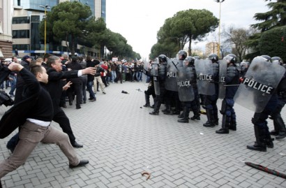 Albanian supporters of the opposition Socialist Party clash with police during an anti-government rally in Tirana